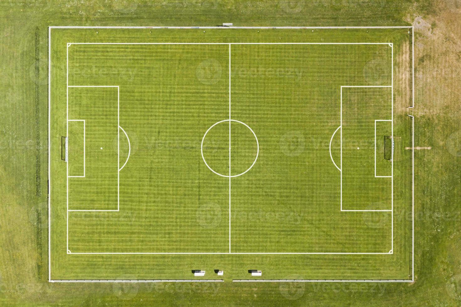 Green football pitch from above photo