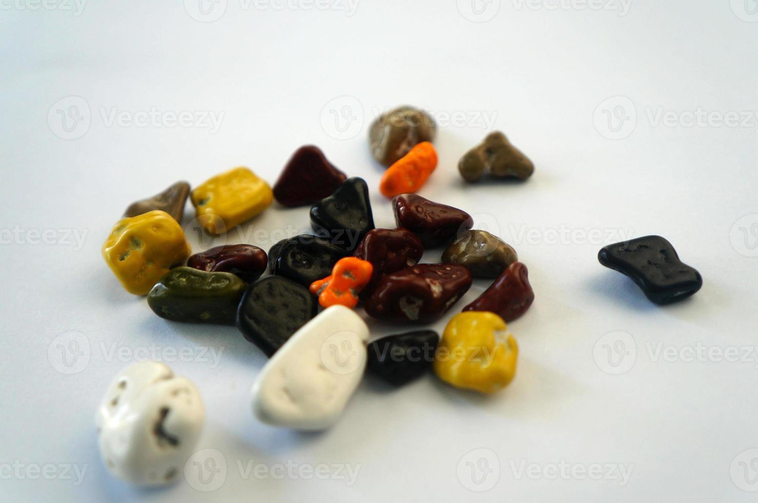 colorful chocolate stones by hajj or umrah isolated on white background photo