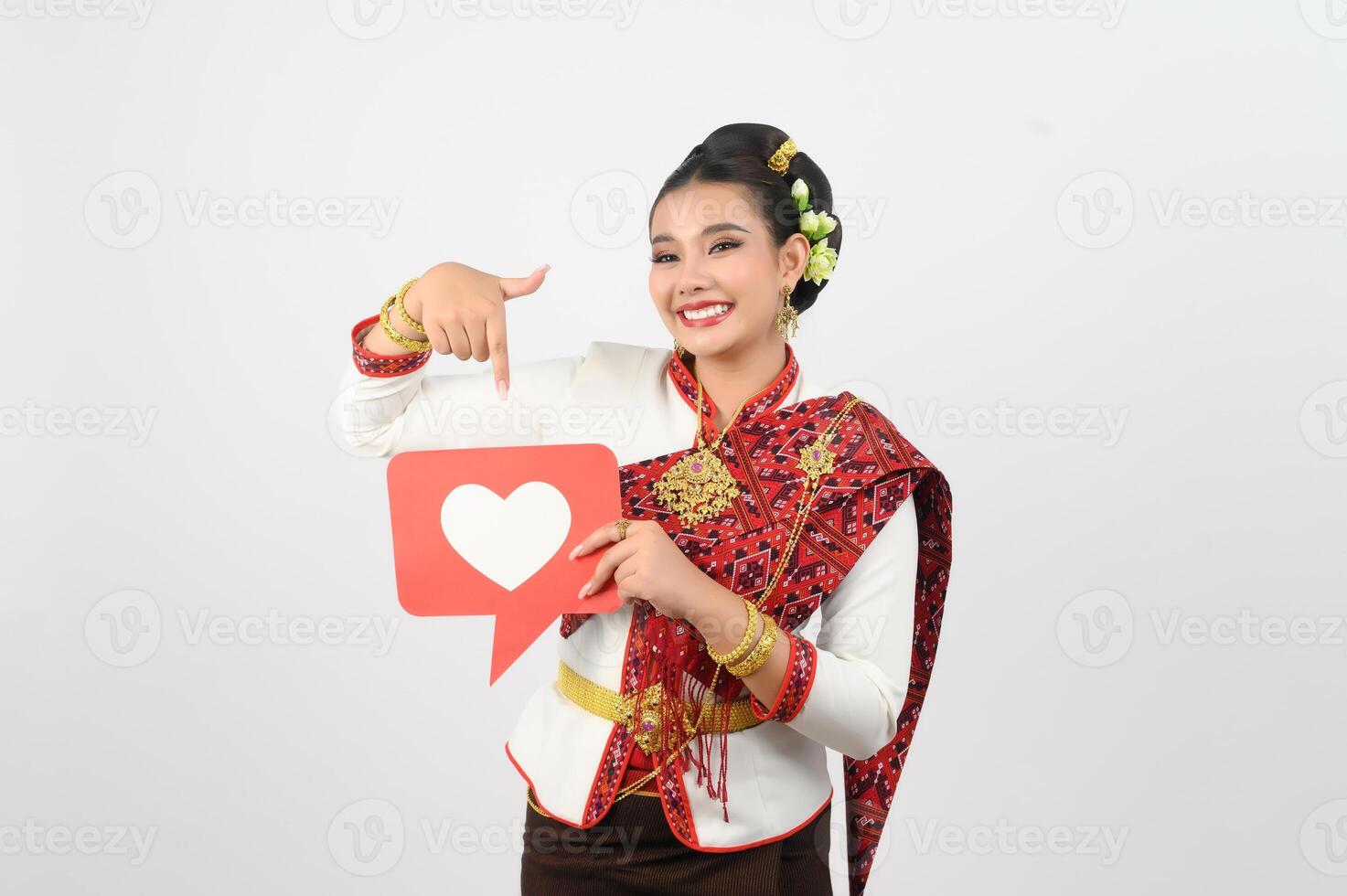 Young beautiful woman in Thai lanna costume with card card in heart symbol photo