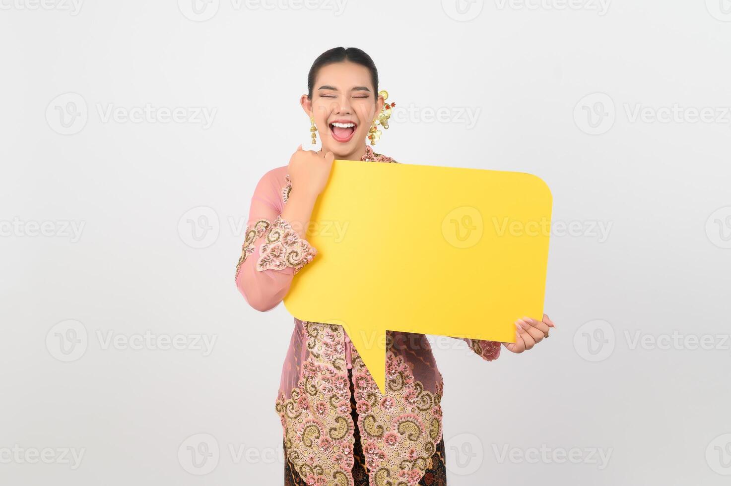 Young beautiful woman dress up in local culture in southern region with speech bubble photo