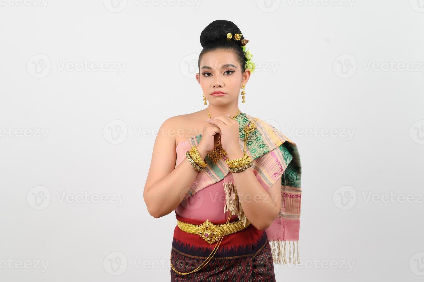 Portrait of Beautiful Woman in Thai northeastern Traditional Clothing standing Posing photo