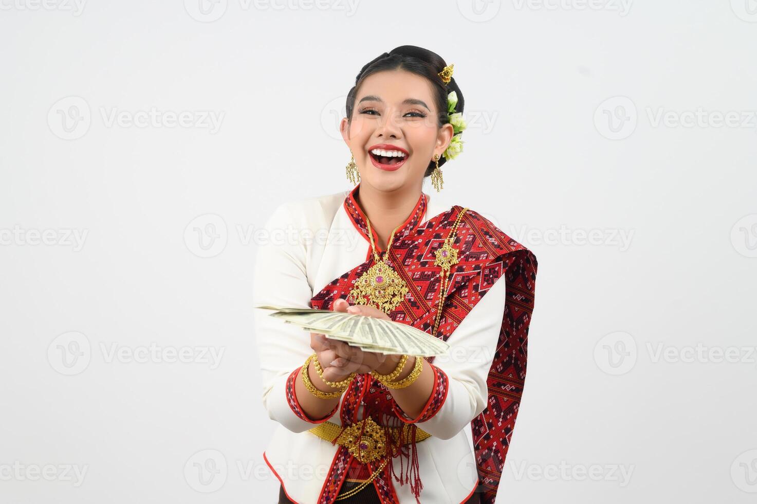 Portrait of Beautiful Thai Woman in Traditional Clothing Posing with fan Banknote photo