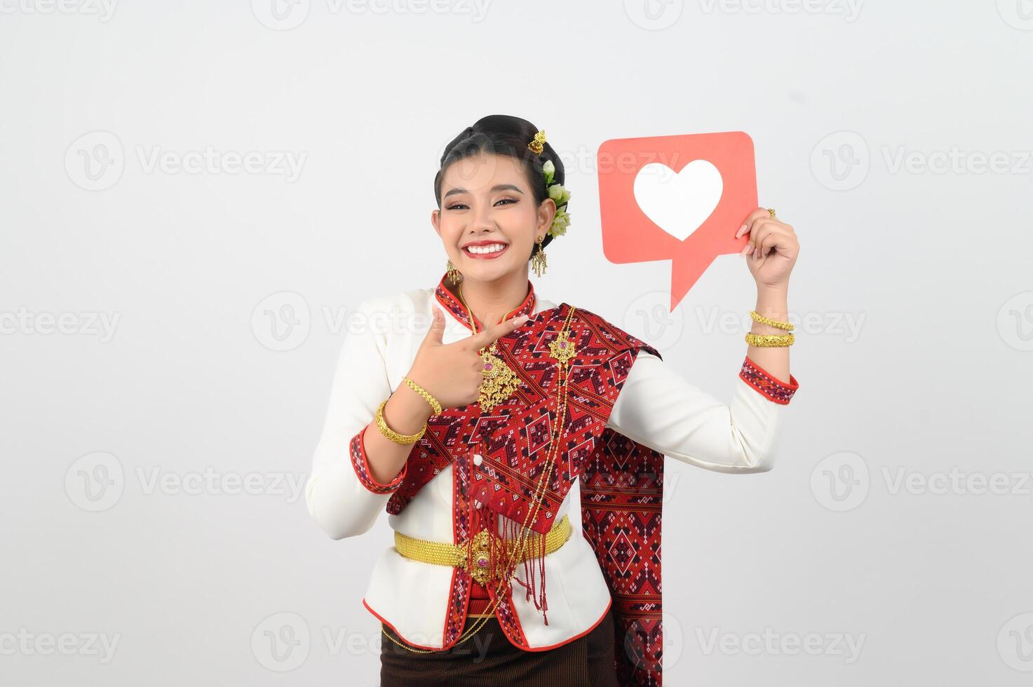 Young beautiful woman in Thai lanna costume with card card in heart symbol photo