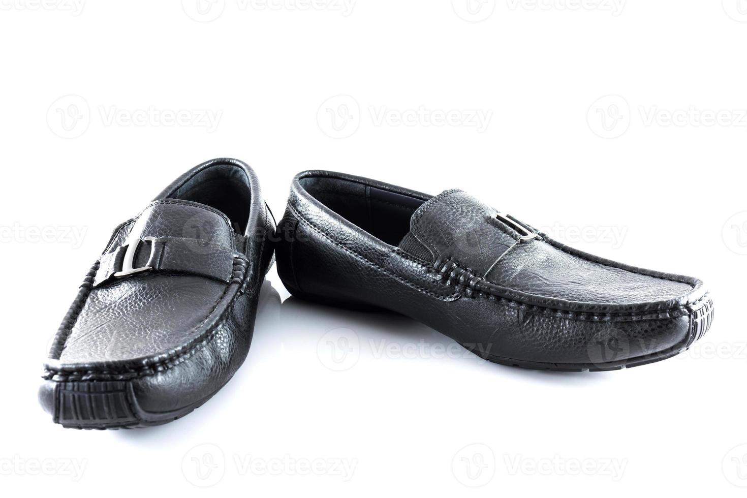 Pair of black male classic shoes on white background photo