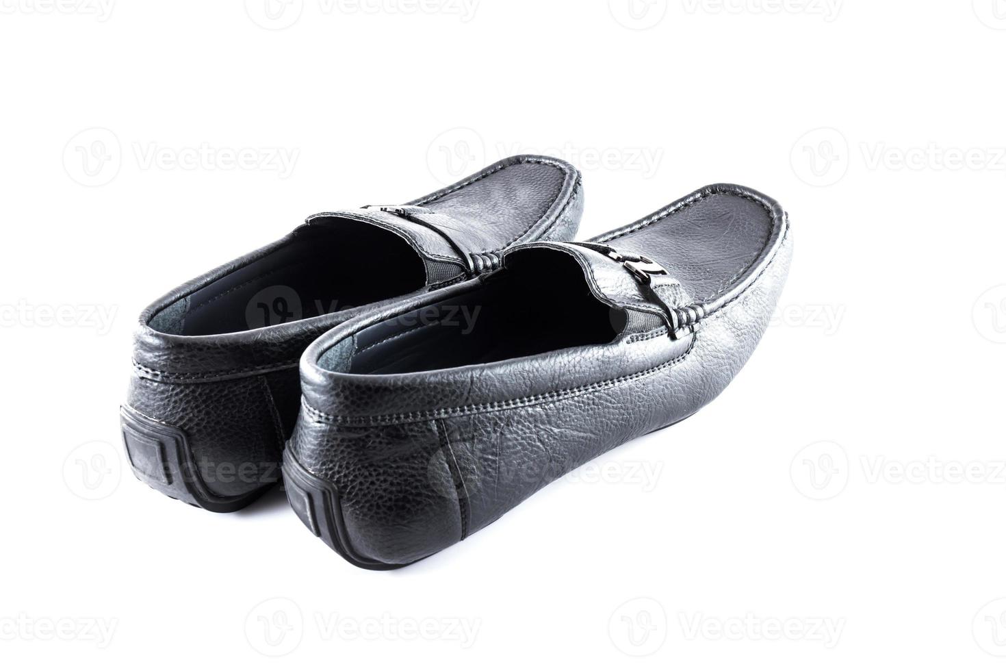 Pair of black male classic shoes on white background photo