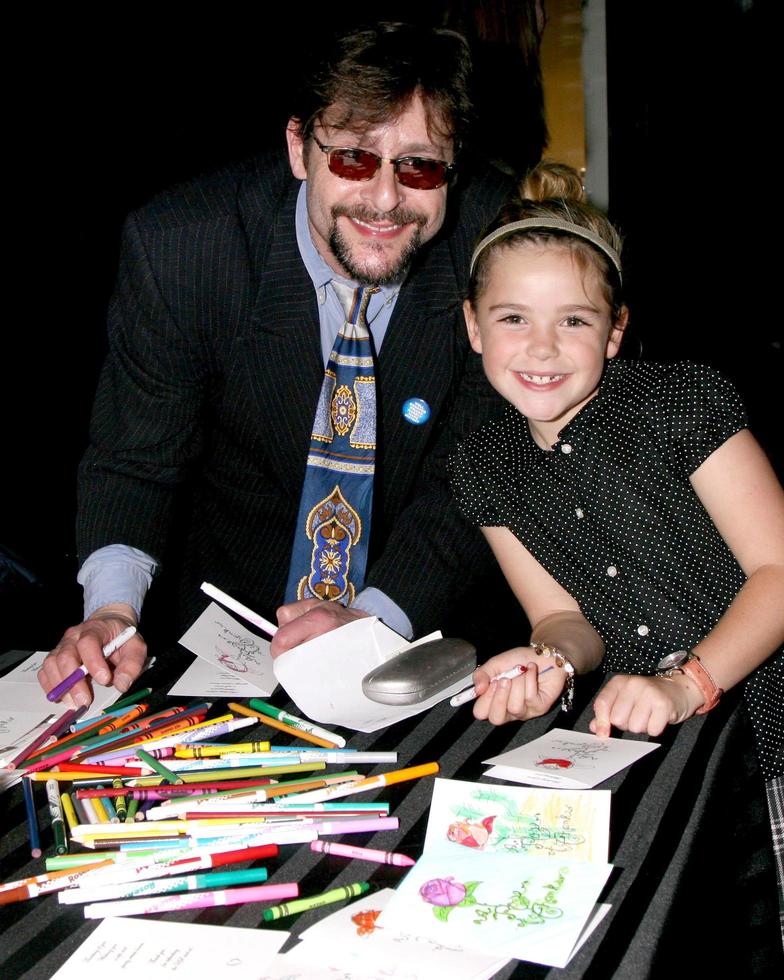 Judd Nelson  Kiernan Shipka of Mad Mencreating a card for A Rose of Thanks who sends thank you cards to troopsGBK Gifting SuiteThompson HotelBeverly Hills CAJanuary 11 20082008 photo