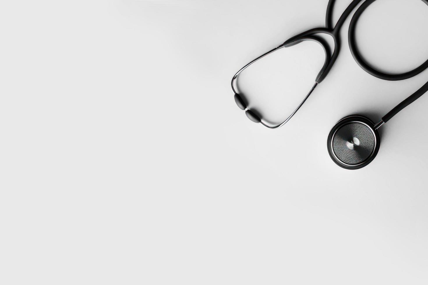 Top view of stethoscope on color  background with empty copy space, flat design. Health medical concept. photo