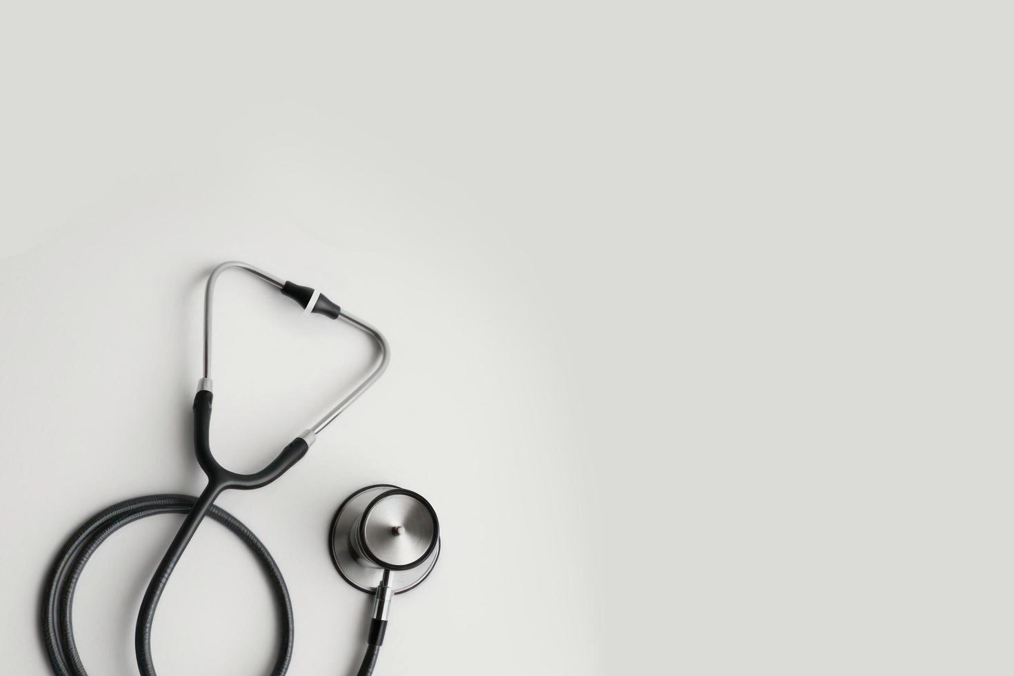 Top view of stethoscope on color  background with empty copy space, flat design. Health medical concept. photo