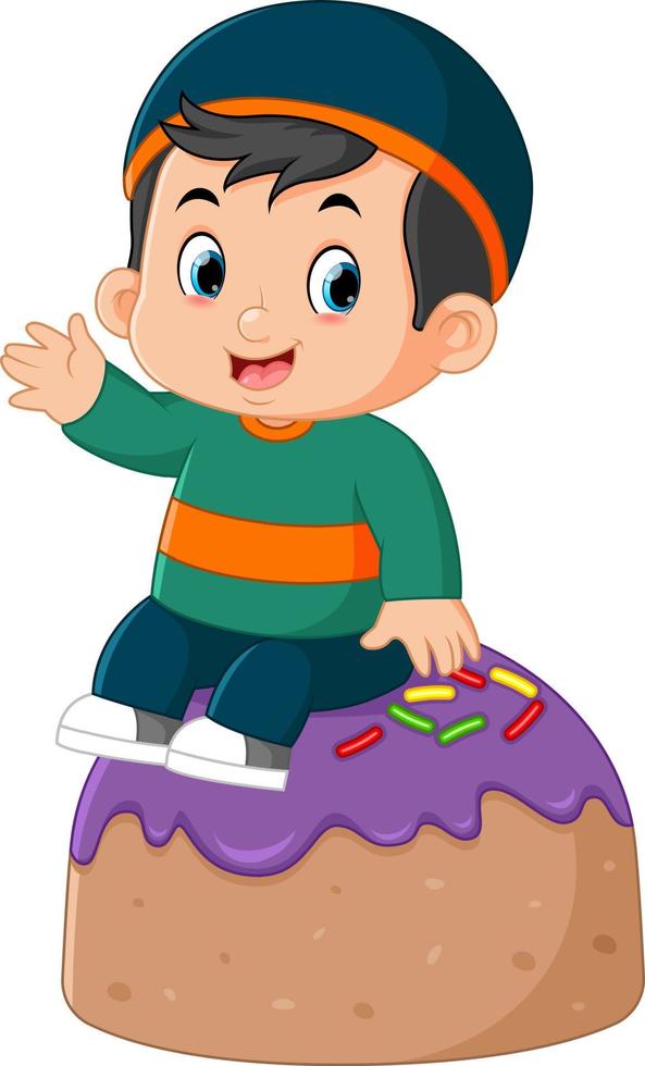 a cute Muslim boy sitting on a big chocolate cake vector