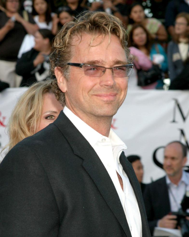 John Schneider and wifeMr  Mrs Smith PremiereManns Village TheaterWestwood CAJune 7 20052005 photo