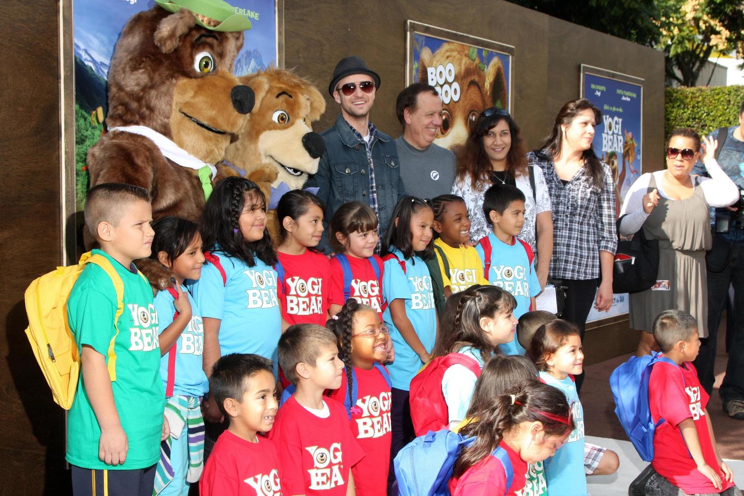 LOS ANGELES  DEC 11  Justin Timberlakem with students who won contect for being most imrproved arrives at the Yogi Bear 3D Premiere at The Village Theater on December 11 2010 in Westwood CA photo