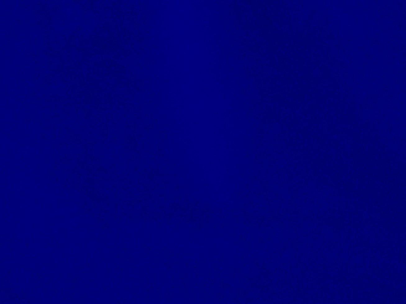 Blue velvet fabric texture used as background. Empty blue fabric background of soft and smooth textile material. There is space for text. photo