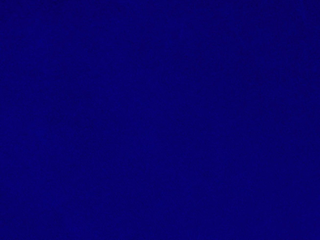Blue velvet fabric texture used as background. Empty blue fabric background of soft and smooth textile material. There is space for text. photo