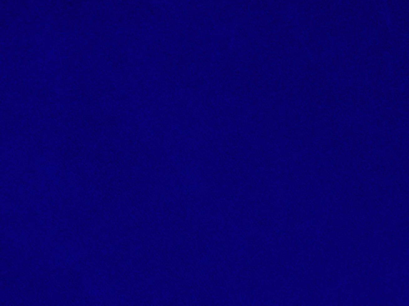 Blue velvet fabric texture used as background. Empty blue fabric background of soft and smooth textile material. There is space for text. photo