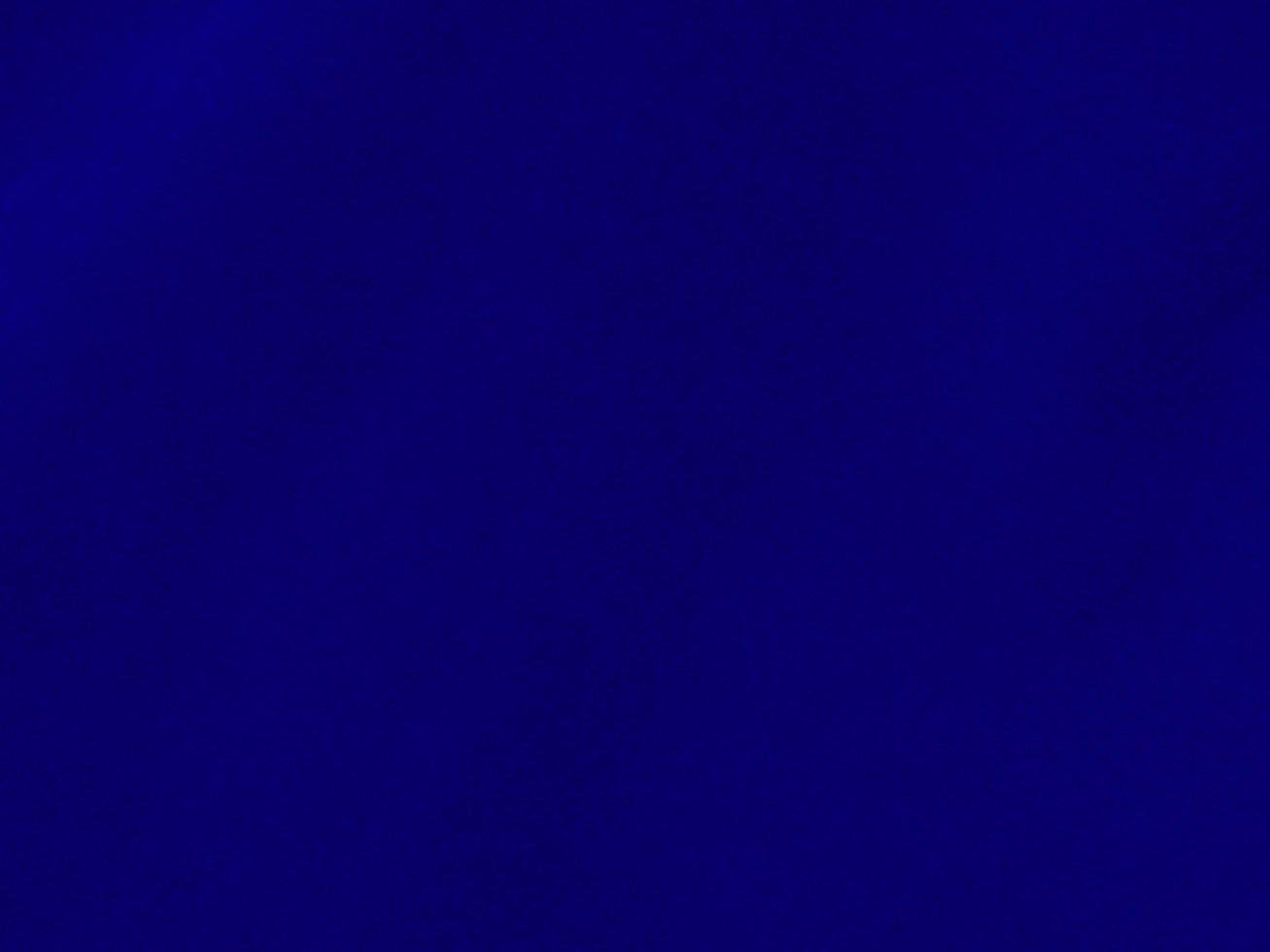 Blue velvet fabric texture used as background. Empty blue fabric background of soft and smooth textile material. There is space for text. photo