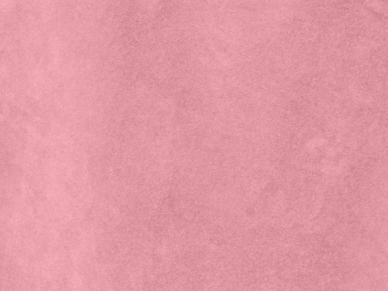 rose gold color velvet fabric texture used as background. Empty pink gold fabric background of soft and smooth textile material. There is space for text.. photo