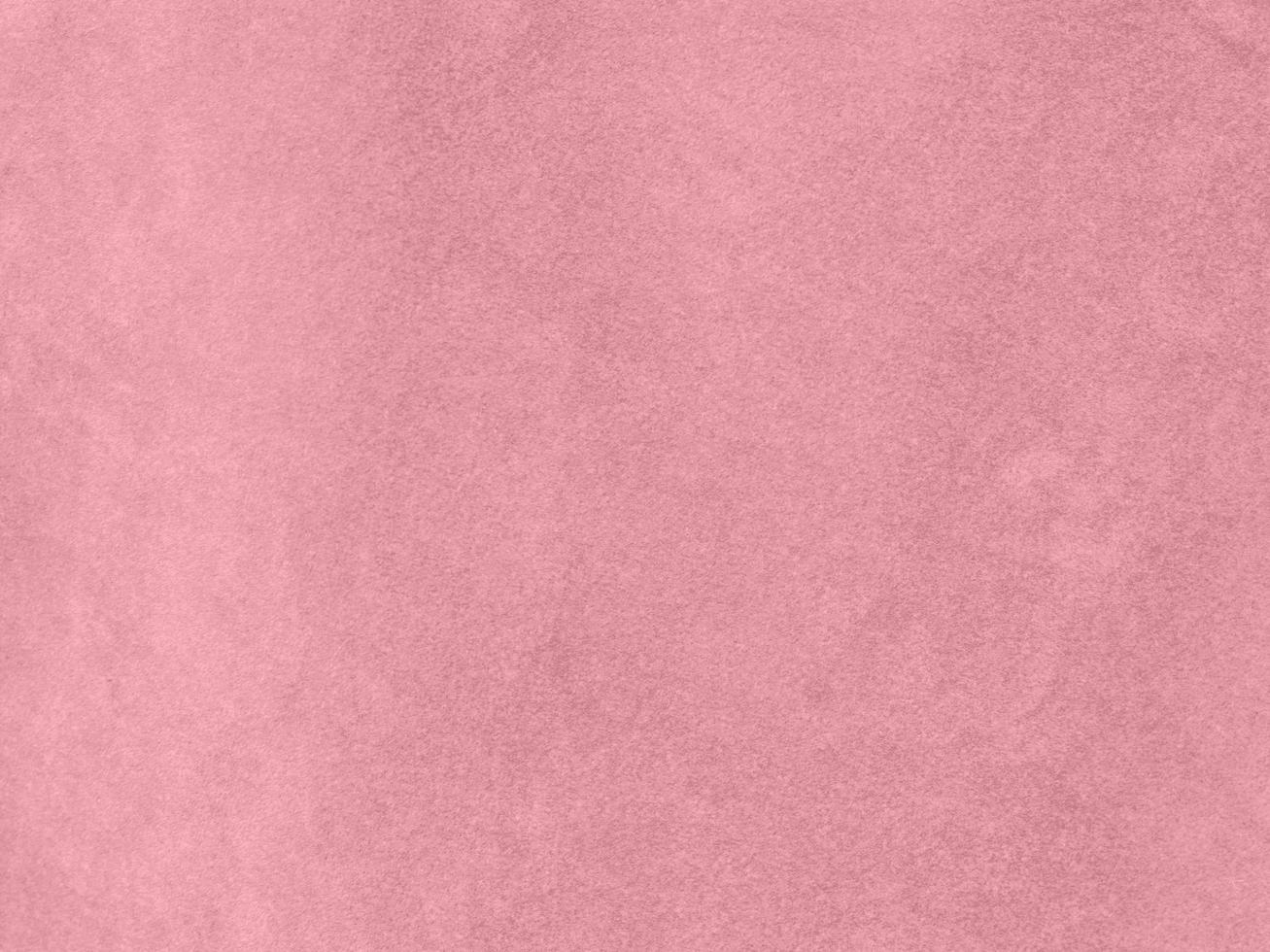 rose gold color velvet fabric texture used as background. Empty pink gold fabric background of soft and smooth textile material. There is space for text.. photo