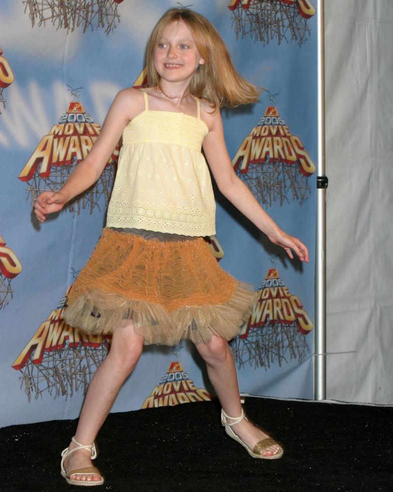 Dakota Fanning in the press room after winning an award for the scariest performer at the MTV Movie Awards at the Shrine Auditorium Los Angeles CAJune 4 20052005 photo