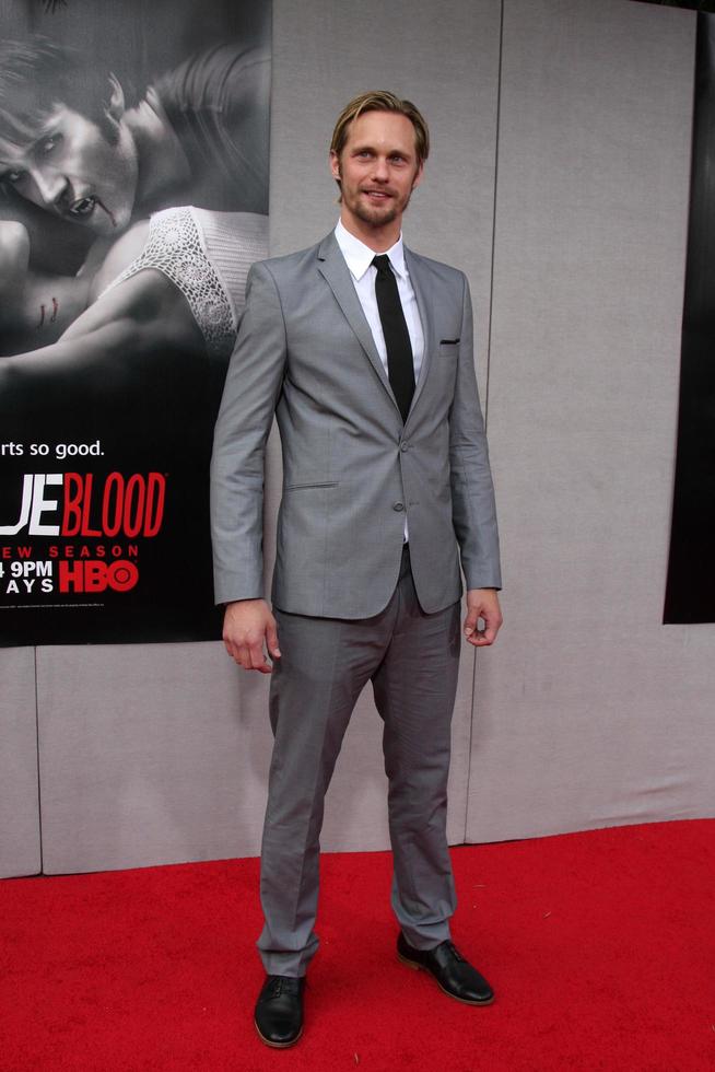 Alexander Skarsgard  arriving at the True Blood Season 2 Premiere Screening at the Paramount Theater  at Paramount Studios in  Los Angeles  CA on June 9 2009 2009 photo