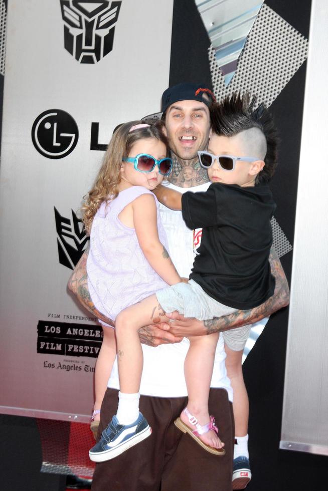 Travis Barker  kids arriving at the Transformers Revenge of the Fallen Premiere at the Manns Village Theater in Westwood CA  on June 22 2009  2009 photo