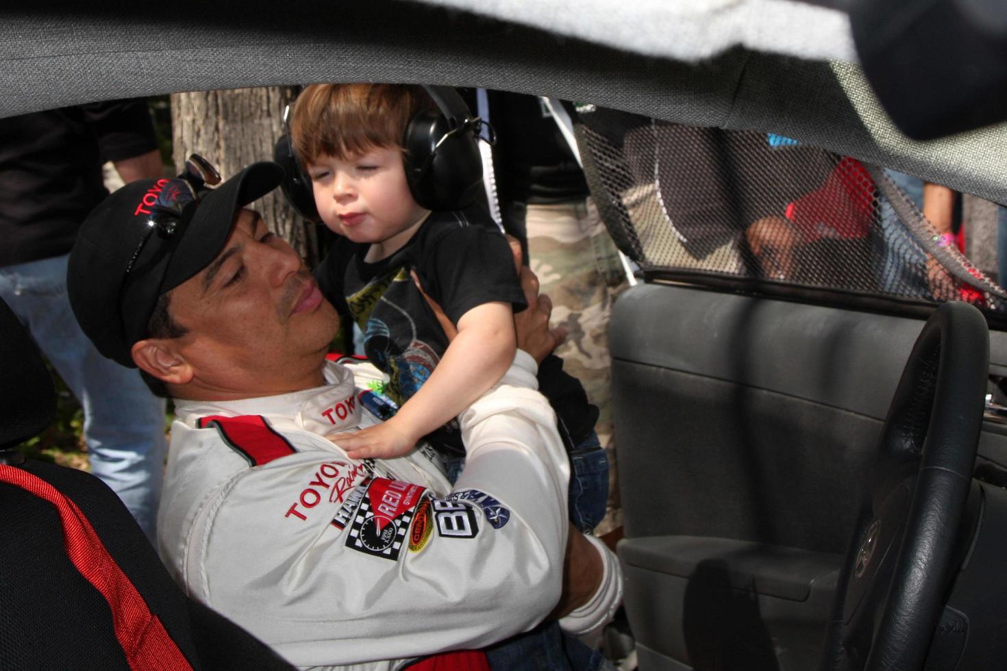 Carlos Mencia  Son Lucas Pablo Mencia  at the  Toyota ProCeleb Race Day on April 18 2009 at the Long Beach Grand Prix course in Long Beach California2009 photo