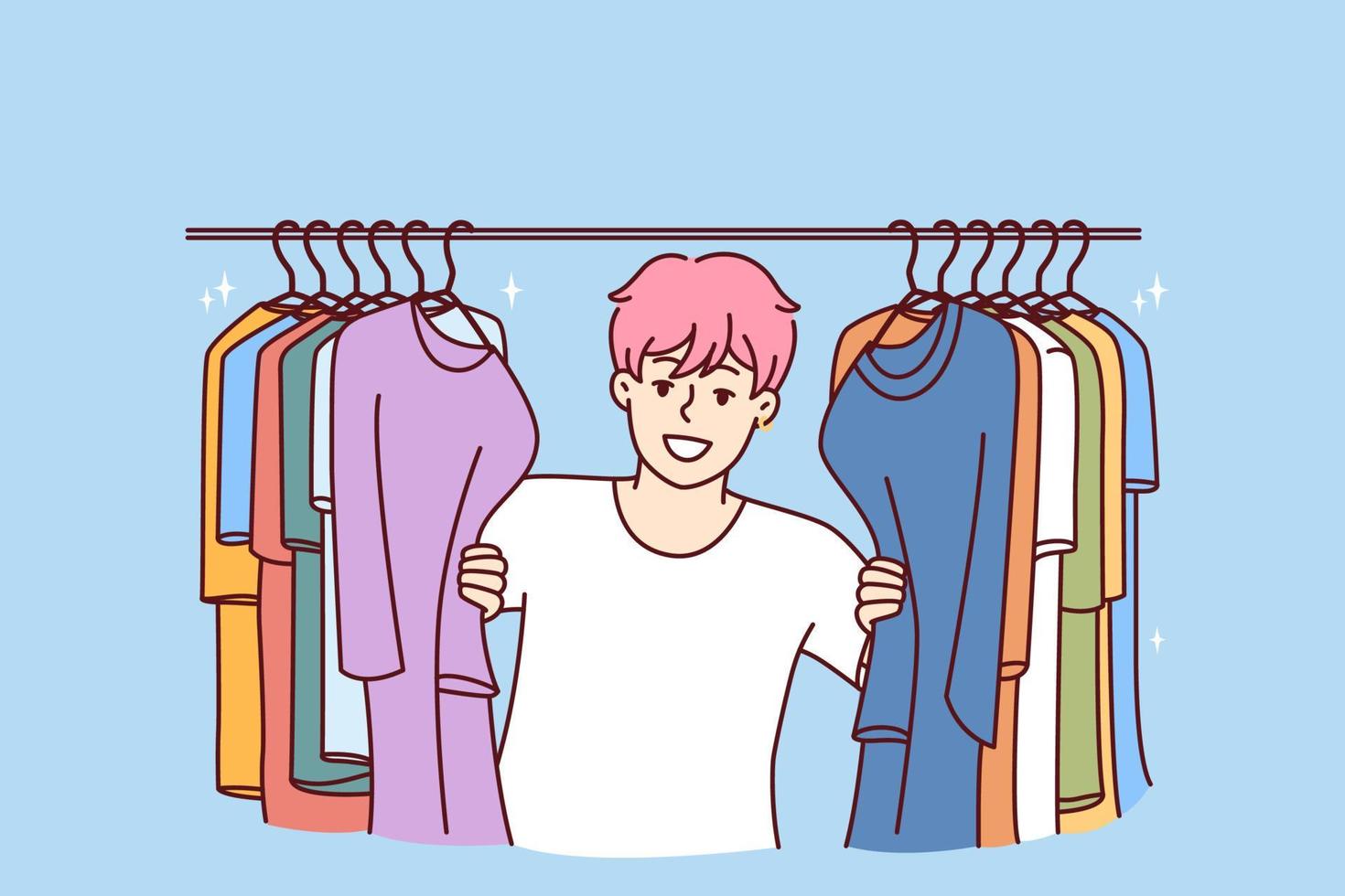 joven alegre hombre en camiseta sonriente echar un vistazo fuera desde detrás percha para colección de ropa elegir nuevo mirar. chico con rosado pelo es en pie en ropa Tienda falto a comprar de moda atuendo vector