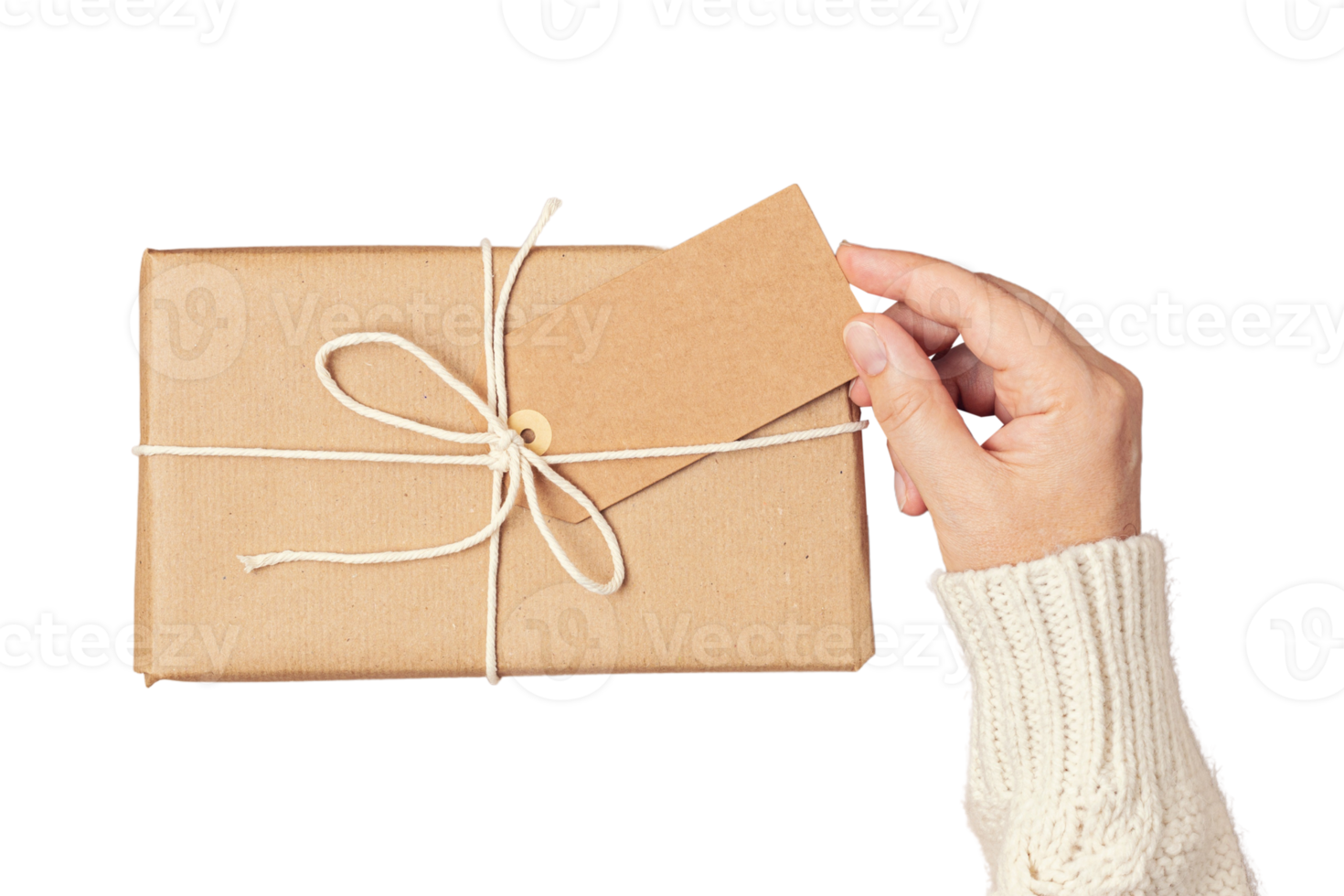Beige gift box held by a woman's hands isolated on a transparent background png