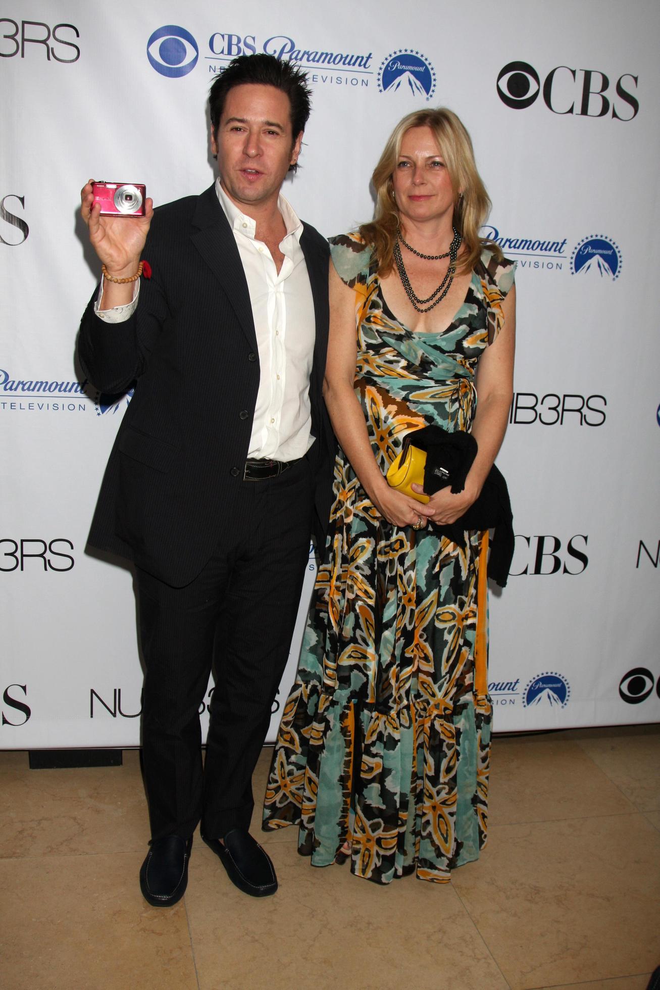 Rob Morrow wife arriving at the Numb3rs 100th Episode Party at the