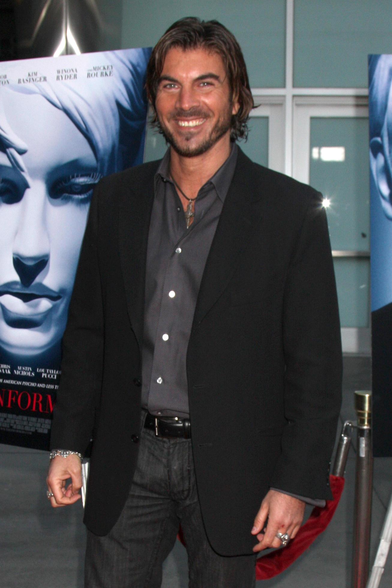 Victor Alfieri arriving at the Informers LA Premiere at the ArcLight