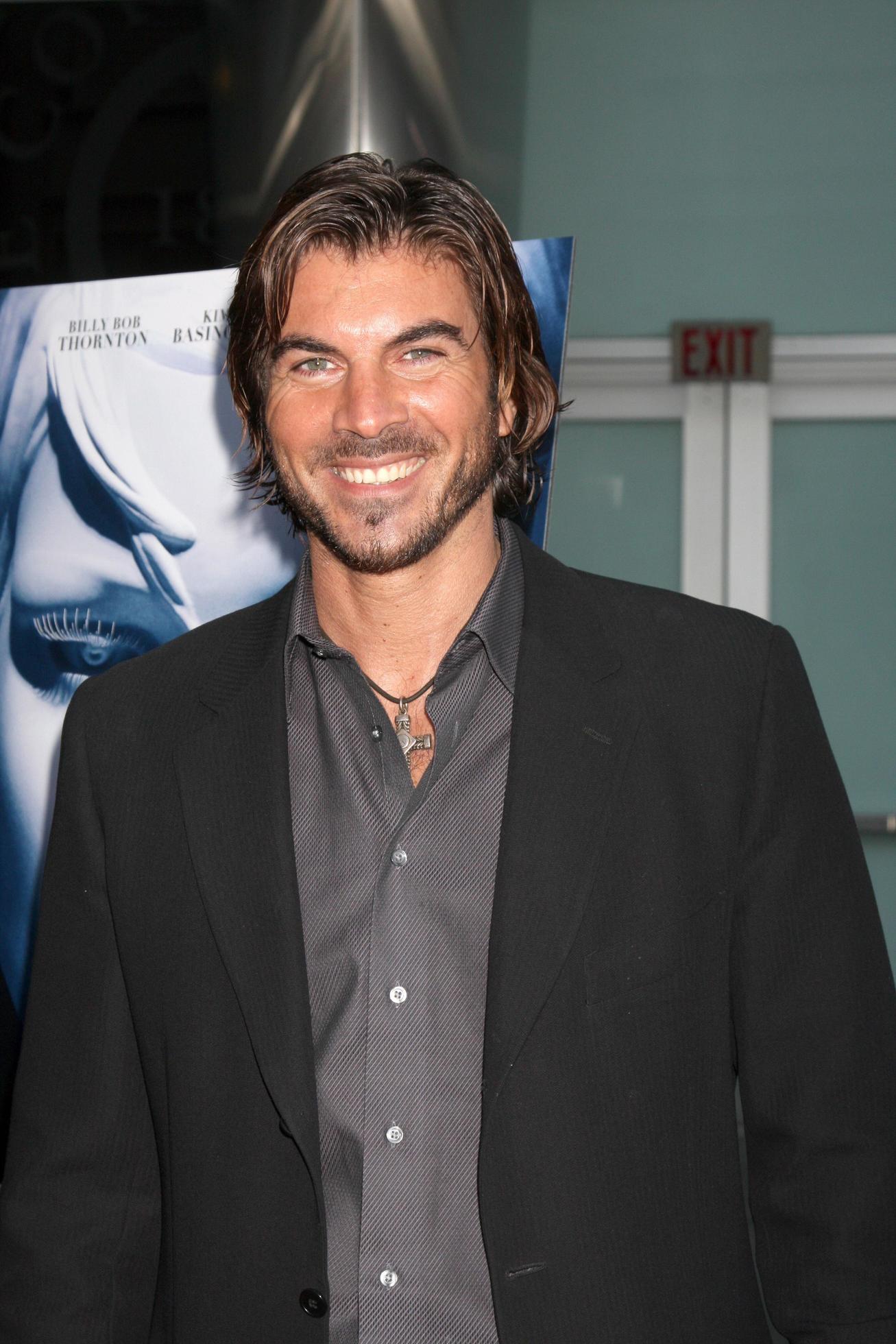Victor Alfieri arriving at the Informers LA Premiere at the ArcLight