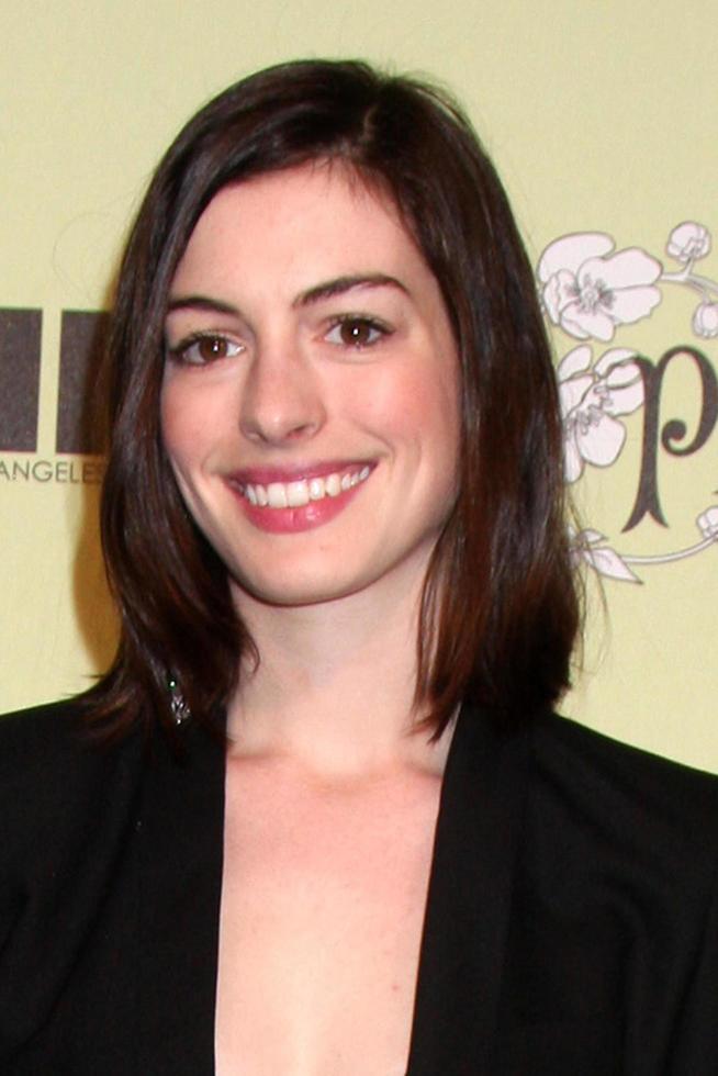 Anne Hathaway arriving at the Women In Film 2nd Annual PreOscar Cocktail Party at the home of Peter  Tara Guber in Bel Air CA onFebruary 20 20092009 photo