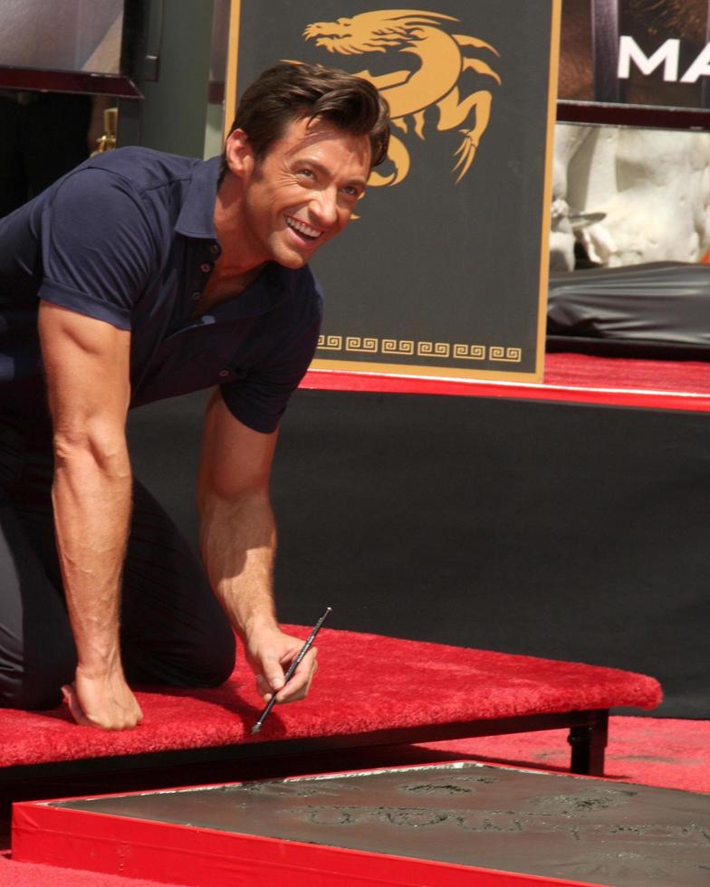 Hugh Jackman  at the Hugh Jackman Handprint  Footprint Ceremony at Graumans Chinese Theater Forecourt in Los Angeles  California on April 21 20092009 photo
