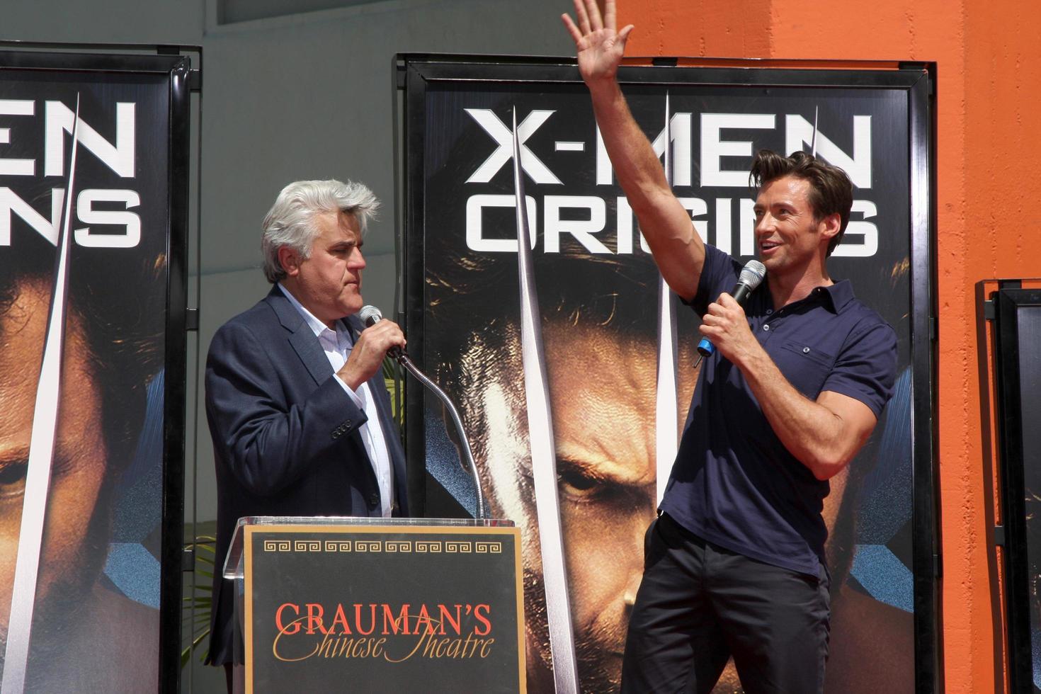 Jay Leno  Hugh Jackman  at the Hugh Jackman Handprint  Footprint Ceremony at Graumans Chinese Theater Forecourt in Los Angeles  California on April 21 20092009 photo