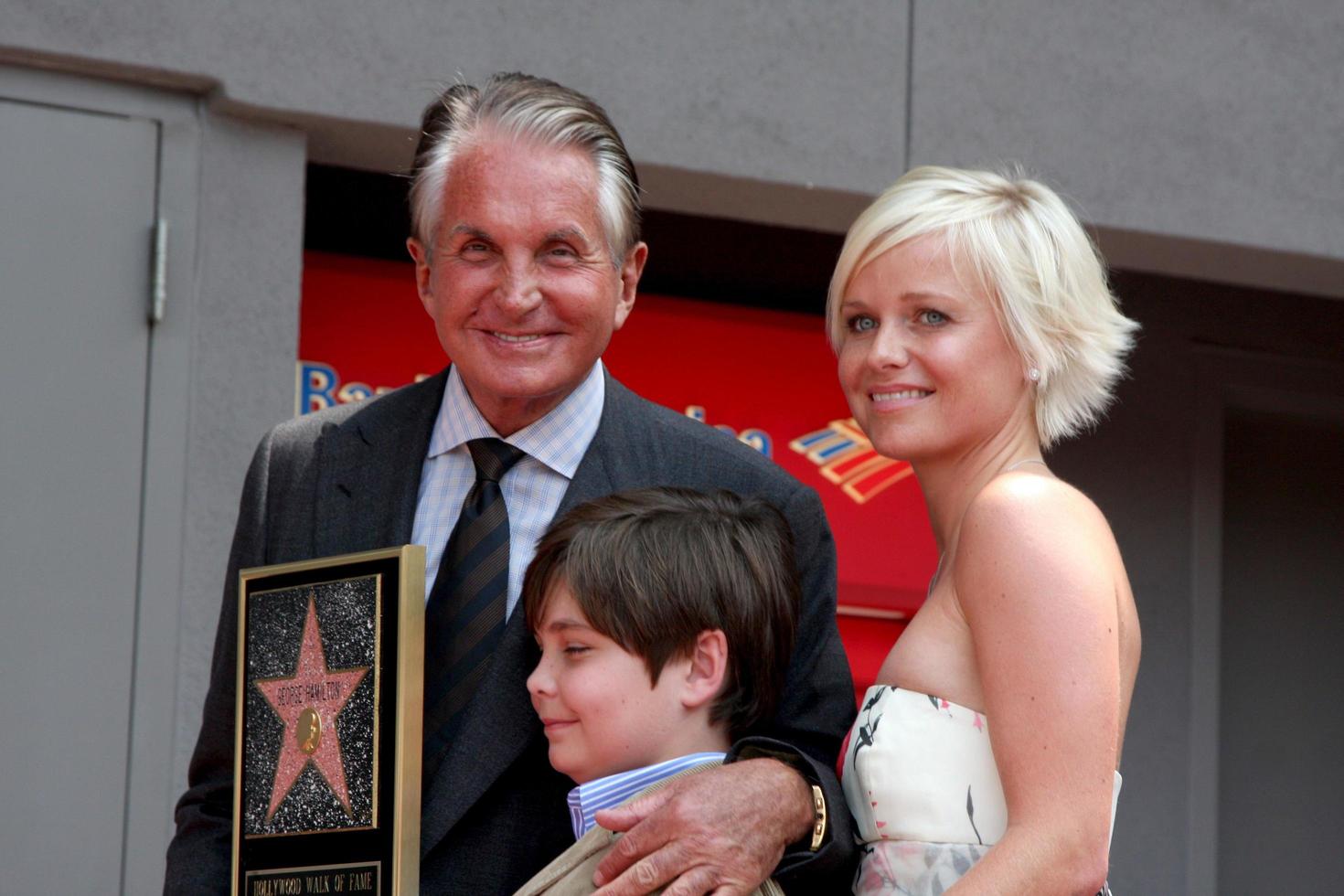 George Hamilton  son GT with girlfriend Barbara Strum at the Hollywood Walk of Fame ceremony bestowing a Star in his honor  in Hollywood CA  on August 12  2009 2009 photo