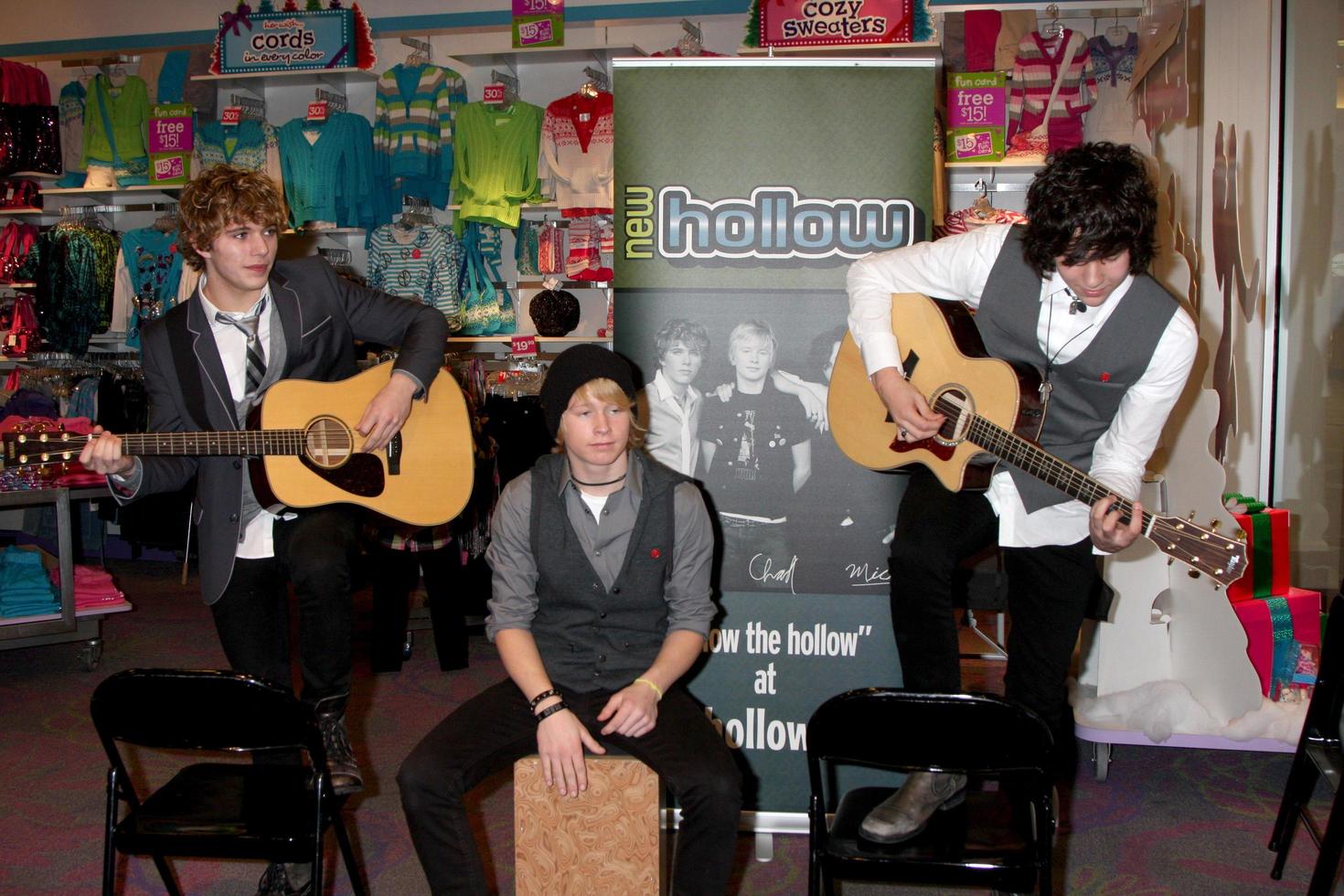 LOS ANGELES  DEC 18  New Hollow  Evan West Chad Blashford and Mick Clouse at a personal appearance by the band New Hollow at Justice  Westfield Fashion Square Mall on December 18 2010 in Sherman Oaks CA photo