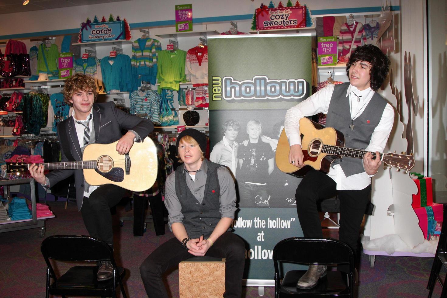 LOS ANGELES  DEC 18  New Hollow  Evan West Chad Blashford and Mick Clouse at a personal appearance by the band New Hollow at Justice  Westfield Fashion Square Mall on December 18 2010 in Sherman Oaks CA photo
