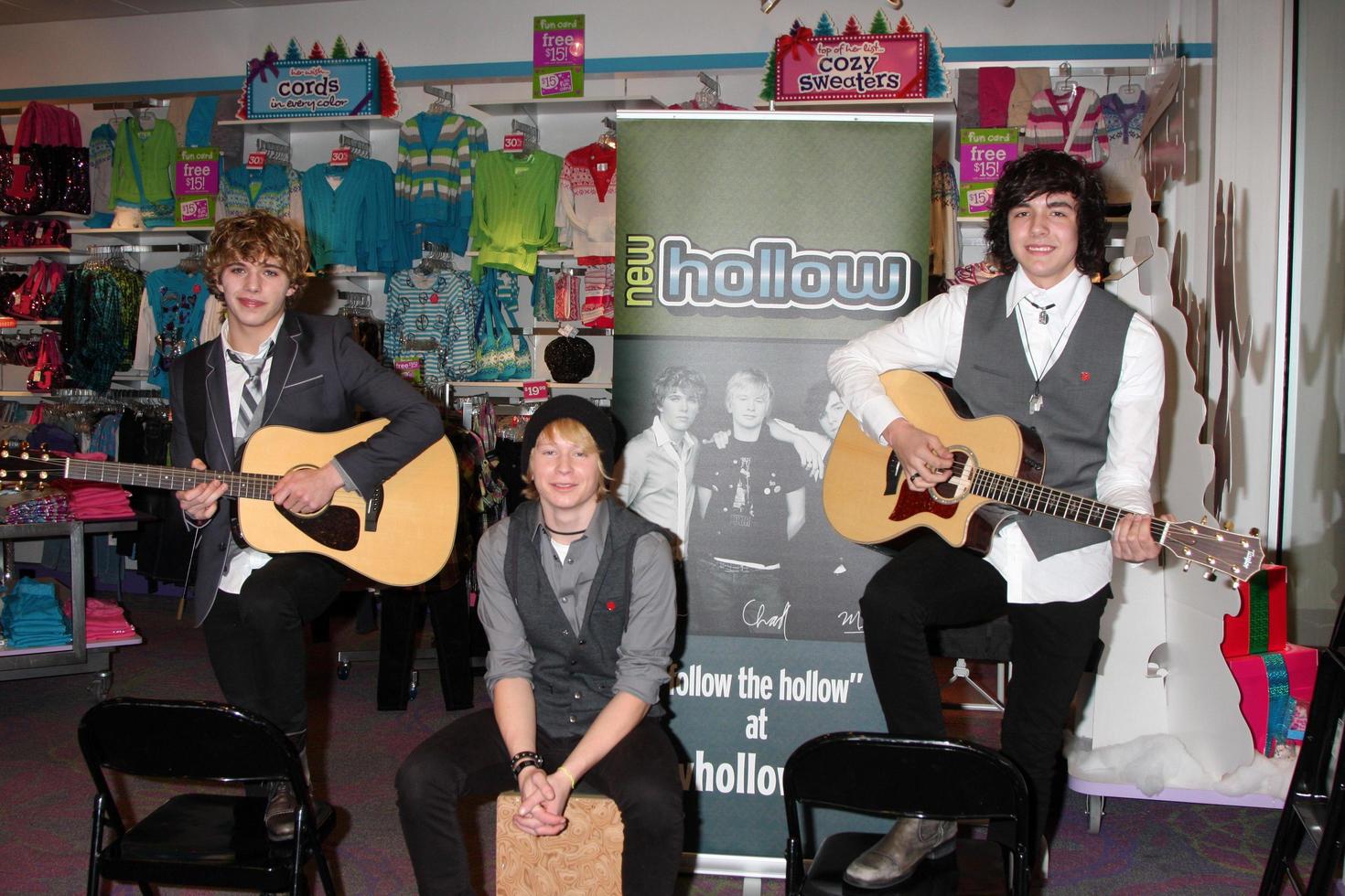 LOS ANGELES  DEC 18  New Hollow  Evan West Chad Blashford and Mick Clouse at a personal appearance by the band New Hollow at Justice  Westfield Fashion Square Mall on December 18 2010 in Sherman Oaks CA photo