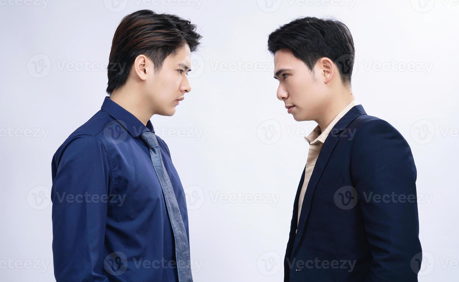 Two Asian men on background photo
