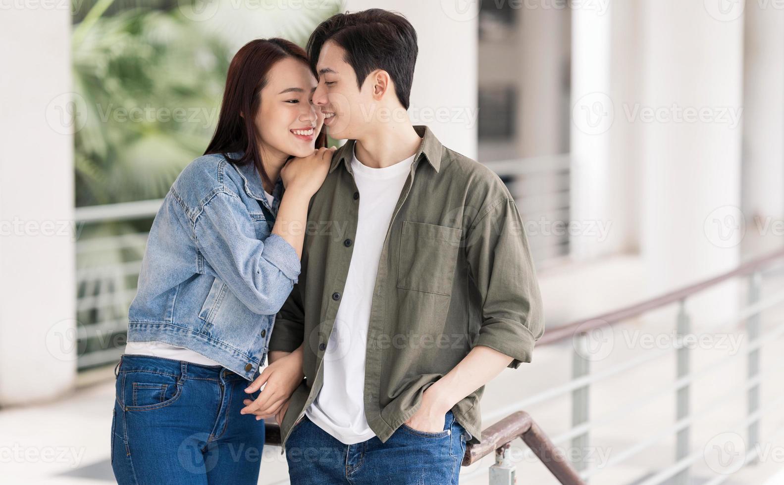 Photo of young Asian couple outdoor