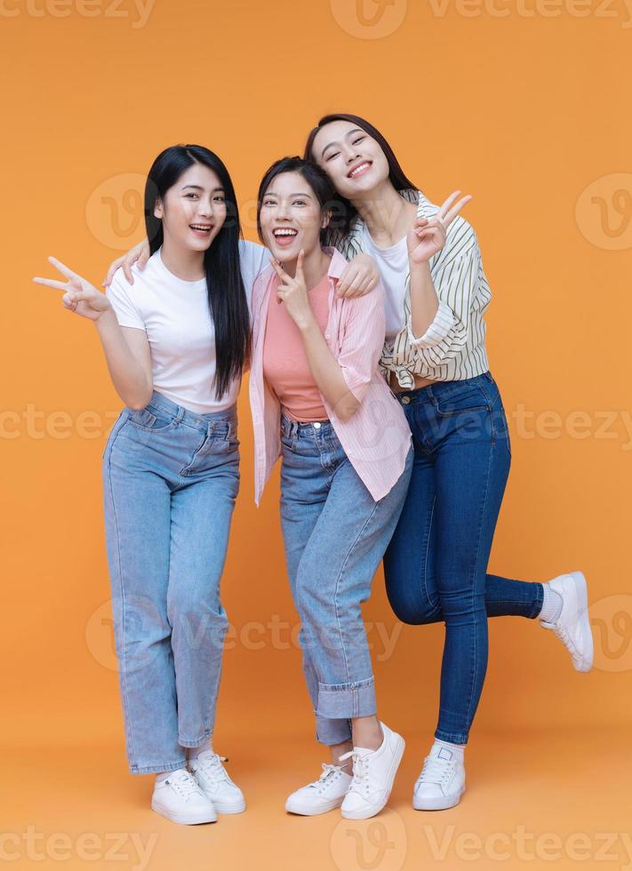 Image of young three Asian girl on background photo