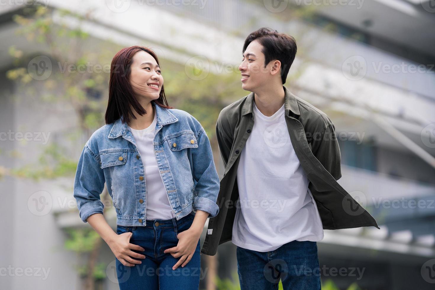 Photo of young Asian couple outdoor