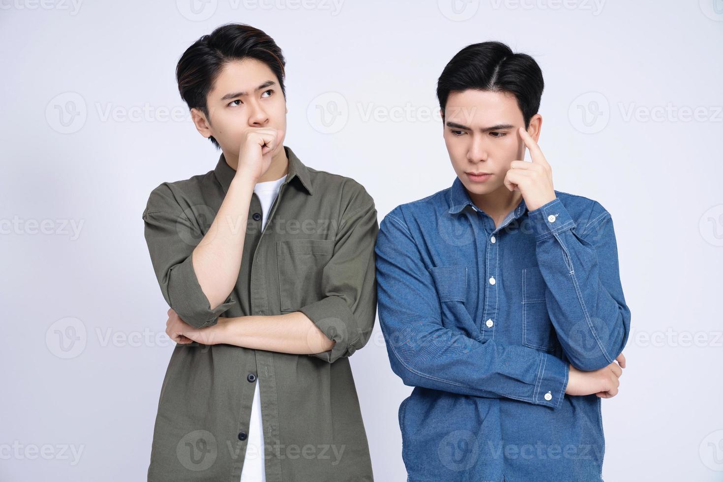 Two Asian men on background photo