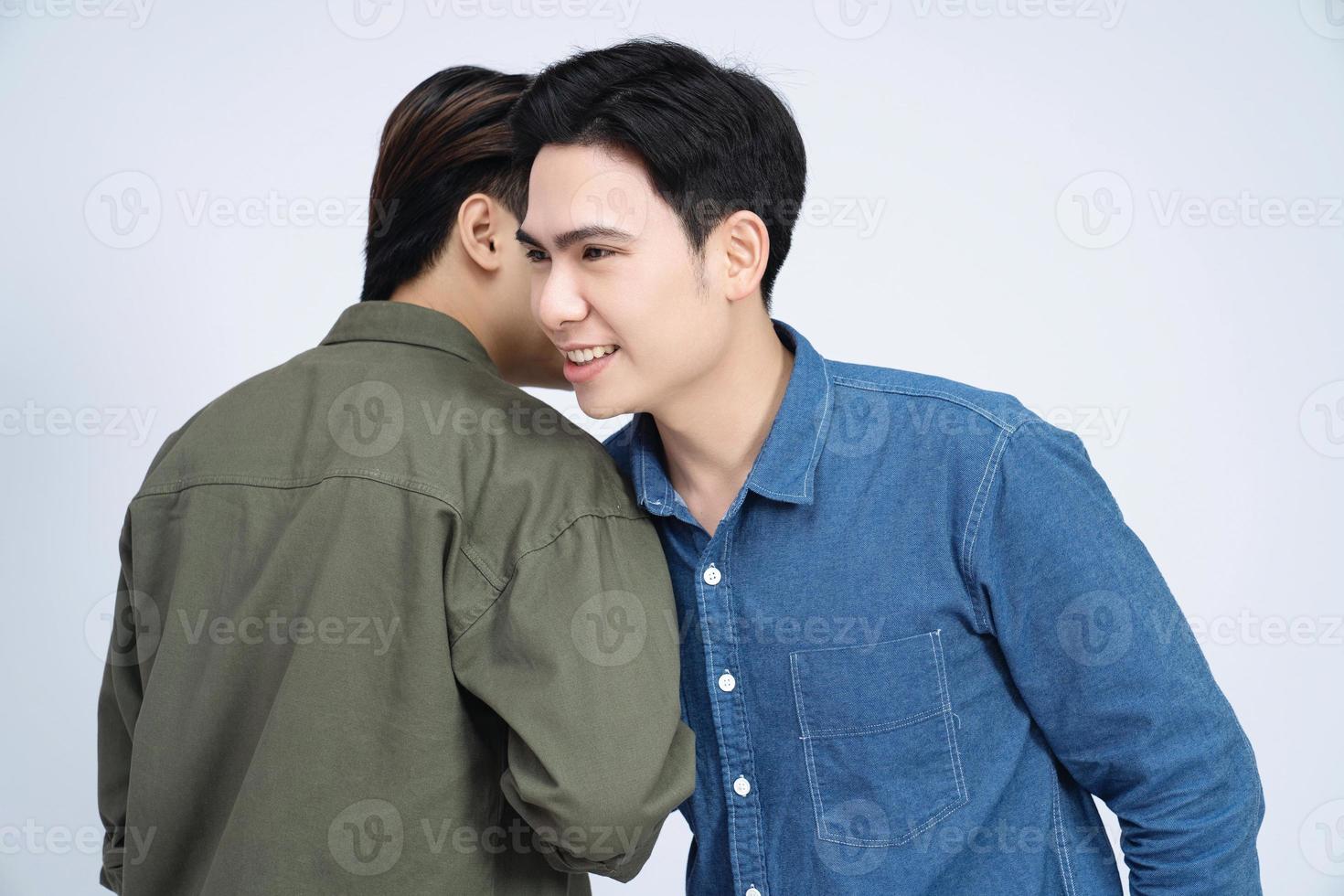 Two Asian men on background photo