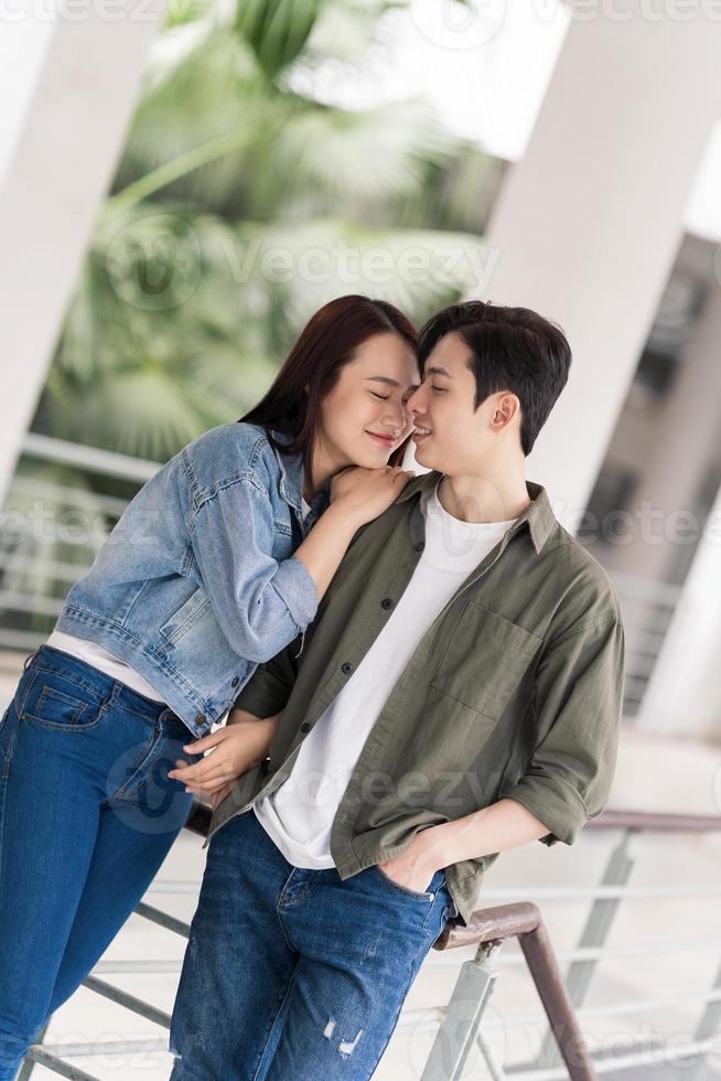 Photo of young Asian couple outdoor