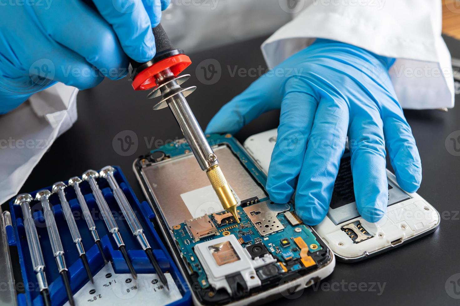 Repairing and upgrade mobile phone, electronic, computer hardware and technology concept. photo