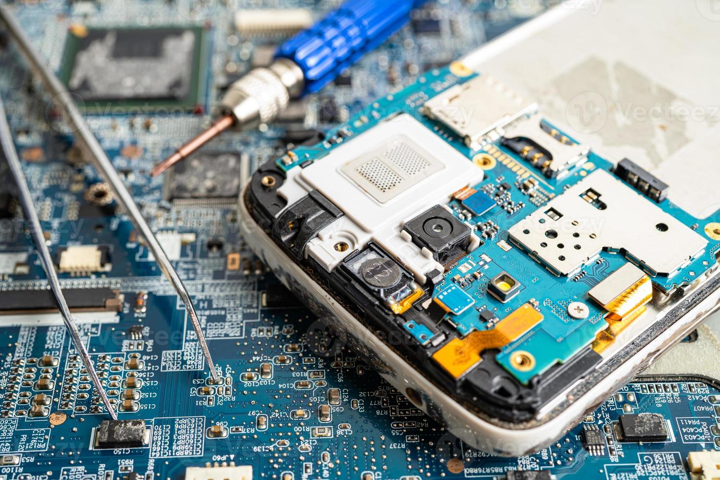 Repairing and upgrade mobile phone, electronic, computer hardware and technology concept. photo