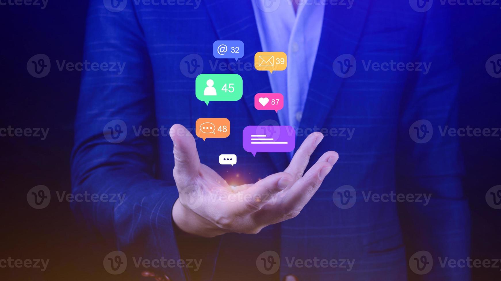 People using social media and digital online marketing concepts with icons such as notifications, messages, comments on the screen. photo