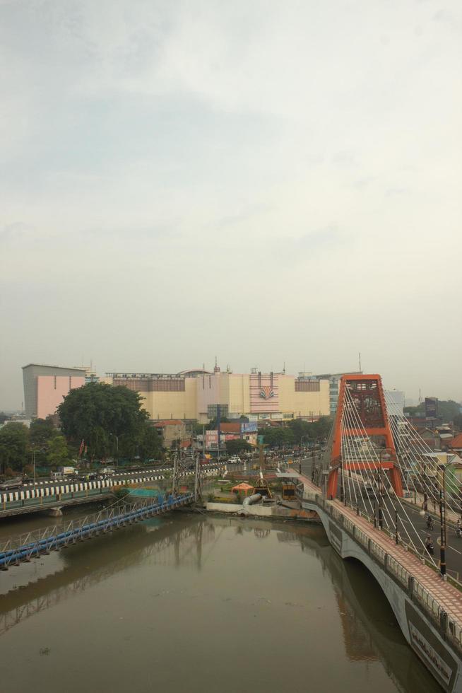 The view of the Darmo Trade Center with the Sawunggaling Bridge, a Surabaya icon photo