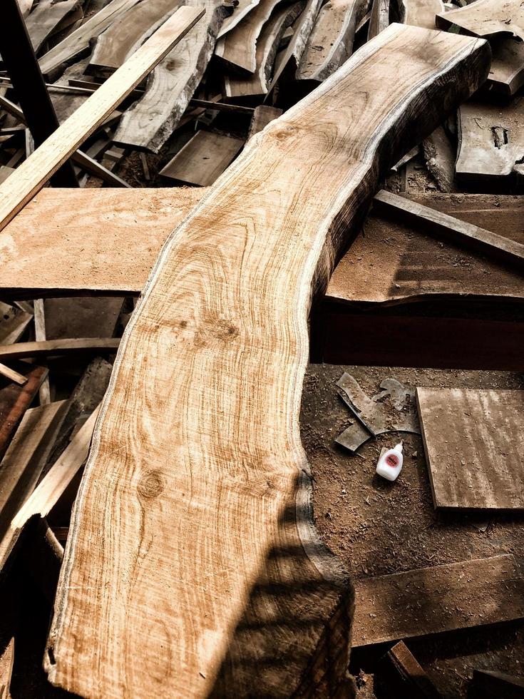 Pile of wooden planks in the timber factory photo