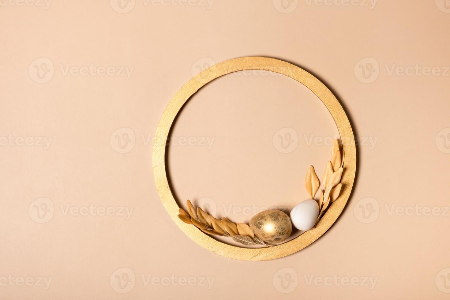 Gold frame with copy space and Easter eggs composition decorated with twigs. Easter mock up, flat lay, temlate photo